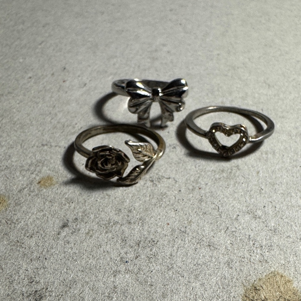 Elegant Silver Tone Ring Set with Bow, Rose, and Heart Designs
